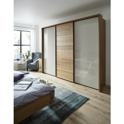 Schwebetürenschrank Lenoso -  B. ca. 260 cm, Eiche massiv, Glas, Champagner